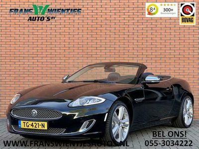 tweedehands Jaguar XK 5.0 V8 Convertible Portfolio | 385 PK! | Leder | Navigatie | 20" Lichtmetaal | LED | Stuurwiel verwarming | Bluetooth | Camera | Stoelverwarming | Elektrische Memory Stoelen |