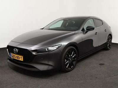 Machine gray (grijs metallic) Occasion 2024 Mazda 3 Homura-Line Hatchback | € 26.750 (Goede deal)