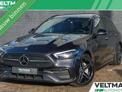 Grijs Occasion 2022 Mercedes C300e AMG line Stationwagen | € 36.795 (Eerlijke prijs)