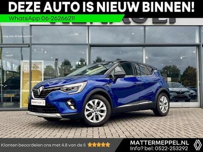 Twotone bleu iron / noir étoilé rqh+gne (blauw metallic) Occasion 2021 Renault Captur Intens SUV | € 22.950 (Eerlijke prijs)