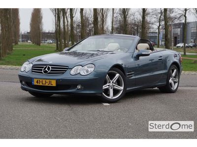 tweedehands Mercedes SL350 l 245 PK l Nederlands geleverde Auto l Keyless Go l Hout leder Stuurwiel l Bi- Xenon l PTS l Comand l CD Wisselaar l Beige Leder l Stoelverwarming l Memory pakket l Dynamische multicontour stoelen voor l Alarm klasse 3...