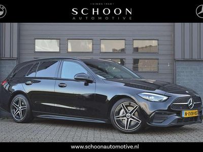Zwart Occasion 2021 Mercedes C200 AMG line Stationwagen | € 33.950 (Iets duurder)