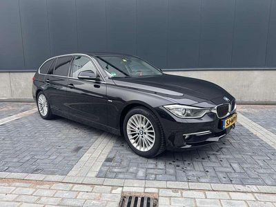 Zwart Occasion 2014 BMW 320 Luxury Line Stationwagen | € 8.000 (Duur)