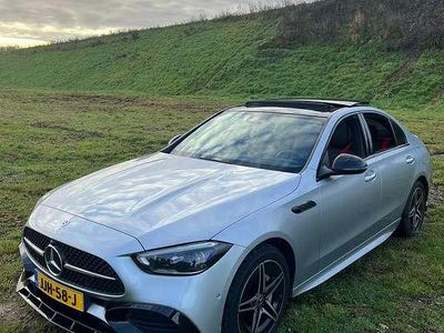 Zilver Gebruikt 2023 Mercedes C300 AMG line Sedan | € 42.500 (Goede deal)