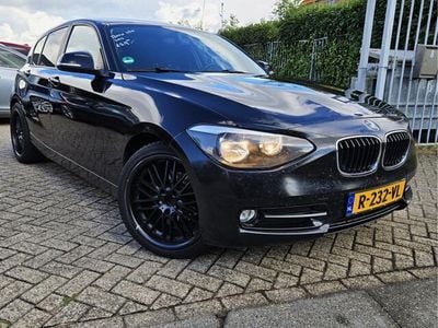 Zwart Gebruikt 2012 BMW 116 Hatchback | € 4.900 (Eerlijke prijs)