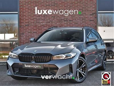 Grijs (metallic) Occasion 2022 BMW 320 M Sport Stationwagen | € 40.900 (Iets duurder)