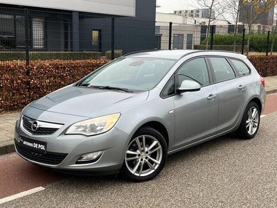 Grijs, metallic lak Occasion 2012 Opel Astra Business Edition Stationwagen | € 6.995 (Eerlijke prijs)