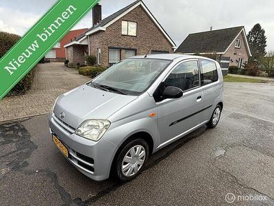 Occasion Daihatsu Cuore 58 PK (42 kW) 2008 Grijs Hatchback