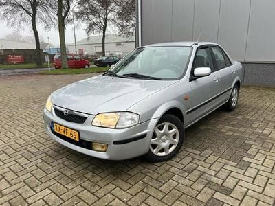 Occasion Mazda 323 88 PK (64 kW) 1998 Grijs Sedan