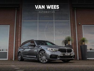 Grijs Gebruikt 2018 BMW 520 Executive Stationwagen | € 27.950 (Eerlijke prijs)