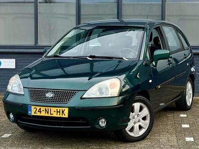 Groen (metallic) Gebruikt 2003 Suzuki Liana GLX Hatchback | € 1.950 (Duur)