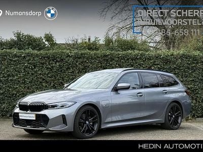 Grijs (metallic) Occasion 2023 BMW 330e M Sport Stationwagen | € 41.895 (Eerlijke prijs)
