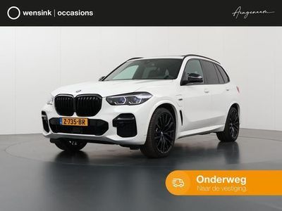 tweedehands BMW X5 xDrive45e High Executive M-Sport | Sky Lounge Panormadak | Trekhaak | Laser Licht | Luchtvering | Stoel&Stuurverwarming | Navigatie | Parkeercamera 360° | Rijassistent-Systeem | Shadowline | 22" Lichtmetaal |