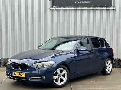 Blauw (metallic) Gebruikt 2012 BMW 116 Sport Line Hatchback | € 6.450 (Eerlijke prijs)