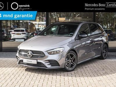 tweedehands Mercedes B180 AMG Line | Panoramaschuifdak | Nightpakket | Smartphone integratiepakket | Actieve afstands-assistent DISTRONIC |