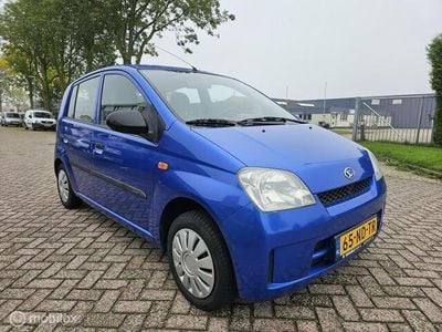 Occasion Daihatsu Cuore 58 PK (42 kW) 2003 Blauw Hatchback