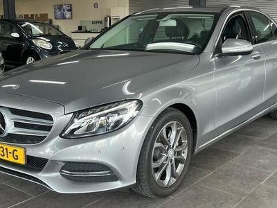 tweedehands Mercedes C200 Ambition navigatie clima cruise controle lm-velgen pdc xenon stoelverwarming dealer onderhouden