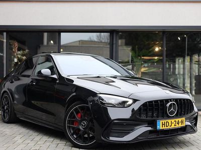 Zwart (metallic) Gebruikt 2022 Mercedes C200 AMG line Sedan | € 34.950 (Eerlijke prijs)