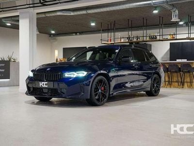 Blauw (metallic) Gebruikt 2022 BMW 330e M Sport Stationwagen | € 36.750 (Eerlijke prijs)