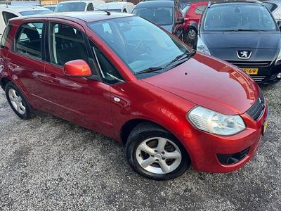 Oranje, metallic lak Gebruikt 2007 Suzuki SX4 Exclusive MPV | € 2.450 (Eerlijke prijs)