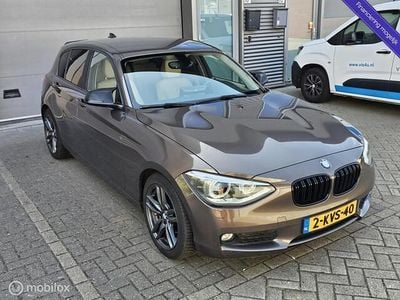 Occasion BMW 114 Executive 102 PK (75 kW) 2013 Bruin Hatchback