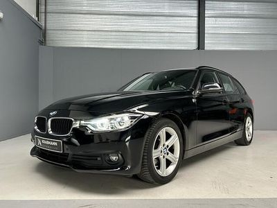 Zwart (metallic) Occasion 2018 BMW 318 Executive Stationwagen | € 11.999 (Super prijs)