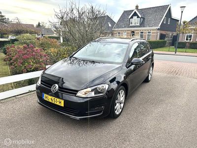 Zwart (metallic) Occasion 2015 VW Golf VII Highline Stationwagen | € 10.950 (Eerlijke prijs)