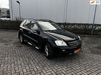 Zwart (metallic) Occasion 2006 Mercedes 320 SUV | € 6.999 (Eerlijke prijs)