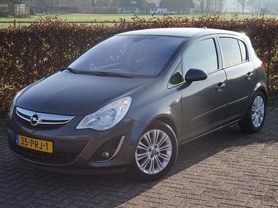 Grijs (metallic) Occasion 2011 Opel Corsa Cosmo Hatchback | € 5.950 (Eerlijke prijs)