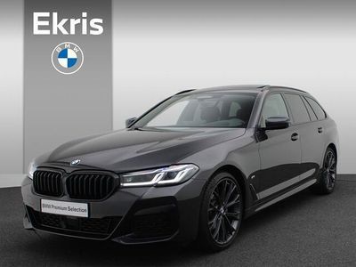 tweedehands BMW 520 5-SERIE Touring i High Executive M Sportpakket / Panoramadak / Laserlight / Adaptief Onderstel / Head-Up Display / Driving Assistant Professional / Integral Active Steering / 20''