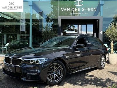 Grijs Gebruikt 2018 BMW 520 M Sport Stationwagen | € 29.950 (Eerlijke prijs)