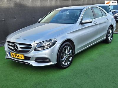 Grijs Occasion 2014 Mercedes C180 Prestige Sedan | € 15.940 (Eerlijke prijs)