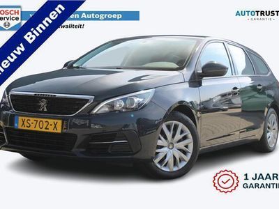 tweedehands Peugeot 308 SW 1.2 PureTech Blue Lease | Incl. 1 jaar garantie | 1ste eigenaar! | Trekhaak | Cruise | Apple carplay | Clima | Start/stop systeem | Navi | Radio | NAP |