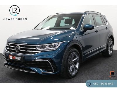 Blauw (metallic) Occasion 2023 VW Tiguan Business+ SUV | € 38.950 (Goede deal)