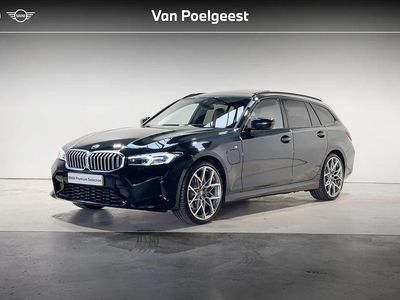 Groen Gebruikt 2024 BMW 330e M Sport Stationwagen | € 50.900 (Eerlijke prijs)