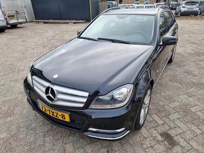 Zwart (metallic) Gebruikt 2011 Mercedes C180 Avantgarde Stationwagen | € 3.945