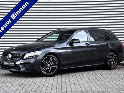 tweedehands Mercedes 180 C-KLASSE EstateBusiness Solution AMG | Panoramadak | Nightpakket | Trekhaak | DAB |