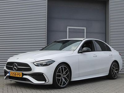 Wit Occasion 2023 Mercedes C180 AMG line Sedan | € 42.999 (Eerlijke prijs)