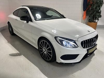 Wit Gebruikt 2018 Mercedes C250 AMG line Coupé | € 28.850 (Eerlijke prijs)