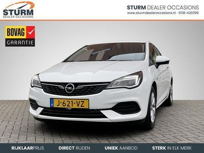 tweedehands Opel Astra 1.2 Edition Trekhaak Airco Cruise Control Apple Carplay/Android Auto Park. Sensor LM Velgen Bluetooth Tel. Rijklaarprijs!