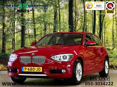 tweedehands BMW 118 1-SERIE i High Executive | Stoelverwarming | Parkeersensoren Achter | Stop/Start systeem | Bluetooth | Navigatie | Isofix |