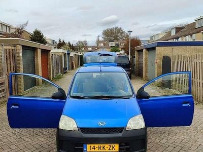 Occasion Daihatsu Cuore 58 PK (42 kW) 2005 Blauw Hatchback