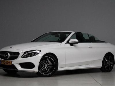 Wit (metallic) Gebruikt 2016 Mercedes C180 AMG Cabriolet | € 24.945 (Eerlijke prijs)