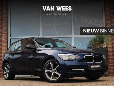 Blauw (metallic) Gebruikt 2011 BMW 116 Sport Line Hatchback | € 6.950 (Eerlijke prijs)