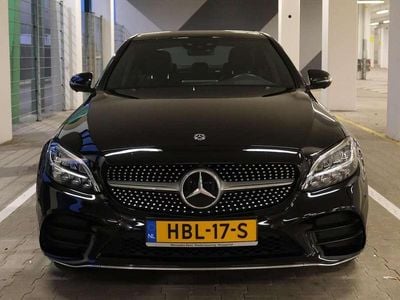 Zwart Gebruikt 2020 Mercedes C300e AMG Sedan | € 31.900 (Eerlijke prijs)