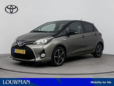 Bruin Occasion 2016 Toyota Yaris Hybrid Hatchback | € 14.745 (Eerlijke prijs)