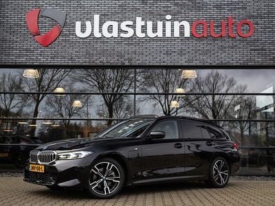 Occasion BMW 330 Basis 109 PK (80 kW) 2023 Zwart Stationwagen