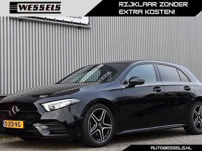 Zwart (metallic) Gebruikt 2022 Mercedes A180 AMG line Hatchback | € 27.500 (Goede deal)