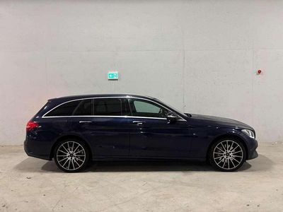 Blauw (metallic) Occasion 2015 Mercedes C350e AMG Sedan | € 18.885 (Eerlijke prijs)