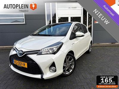 Wit (parellak) Gebruikt 2016 Toyota Yaris Hybrid Hatchback | € 9.995 (Eerlijke prijs)